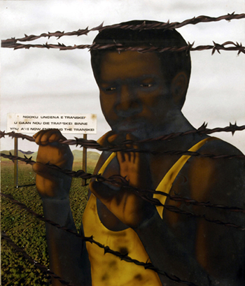 apartheid era bantustan barren landscape homeland with destitute man staring out from behind barbed wire fence