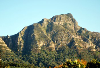 Devil's Peak aglow and beautifully menacing under warm early morning sunlight.
