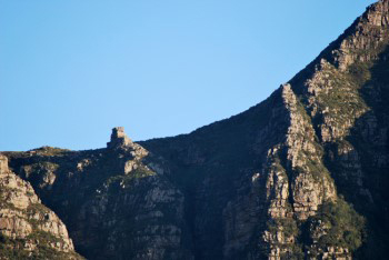 Closer view of The Pulpit, that resembles a church lecturn, standing up on its own on the mountain horizon beween Els buttress and Devil's Peak.