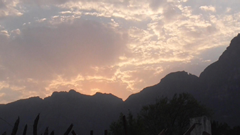 sunset ona cloudy evening  on the easst side of Table Mountain
